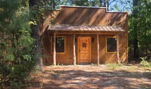 Rustic Trails Texas LLC in the wild woods, Wedding Venue, Air BnB, Retreats, Anniversary, Birthday, Class, School, Education, Meeting, Church, Upper Room, Jail, Livery, Land Office, Bunk House, Bank, Bath House, Piney Woods, Cabins, Cottages, rentals