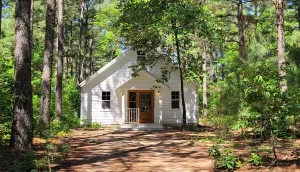 Rustic Trails Church in the wild woods, Wedding Venue, Air BnB, Retreats, Anniversary, Birthday, Class, School, Education, Meeting, Church, Upper Room, Jail, Livery, Land Office, Bunk House, Bank, Bath House, Piney Woods
